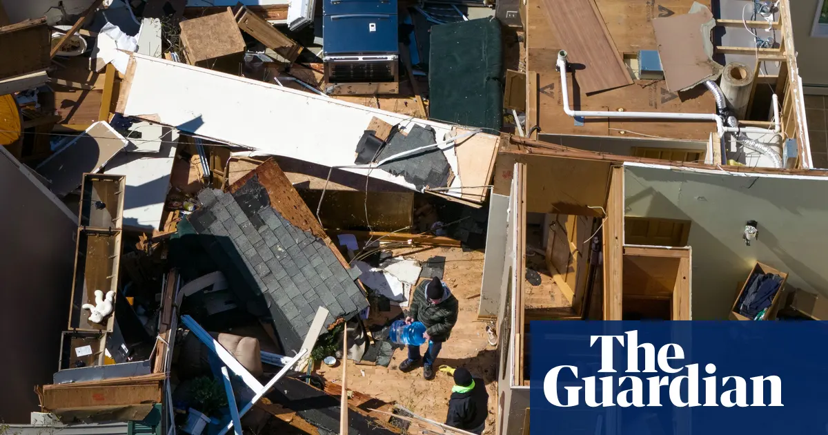Tornadoes and heavy winds destroy homes and roads across US midwest