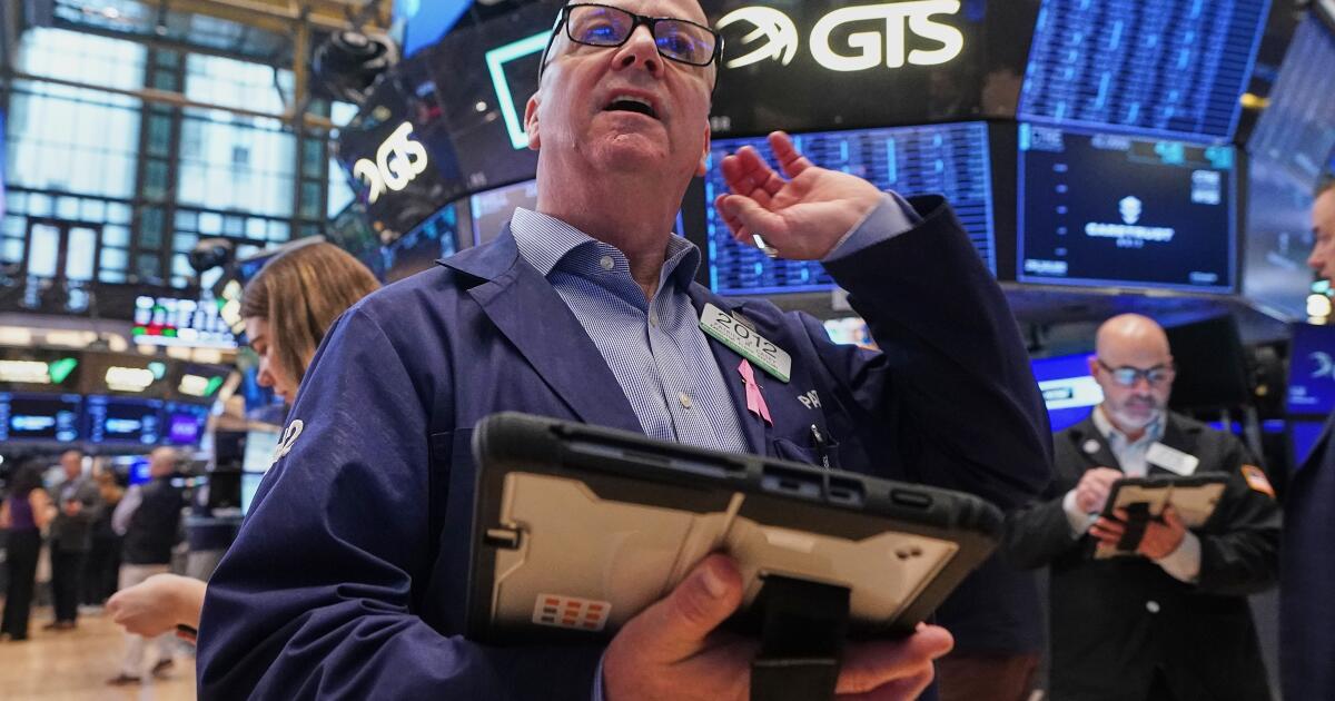 Stocks drop from records as worries about oil prices rattle the bond market