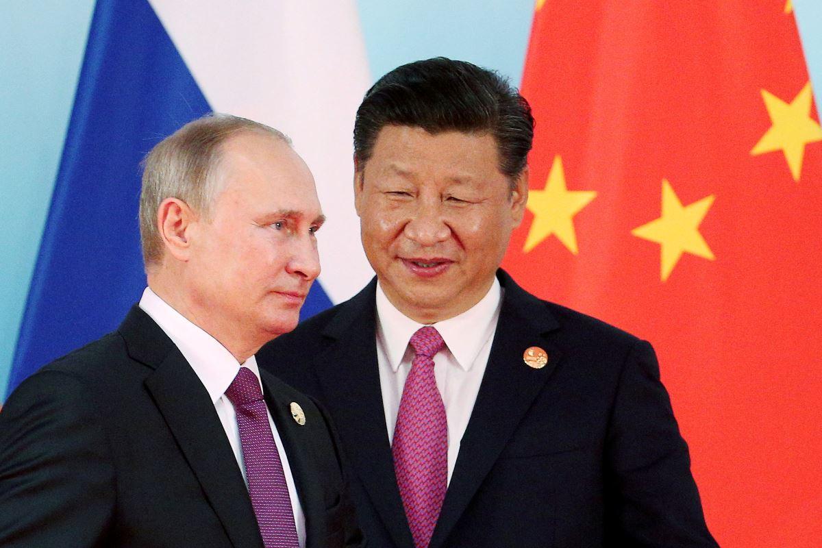 Xi to host 'old friend' Putin as China projects stable global role after Trump visit
