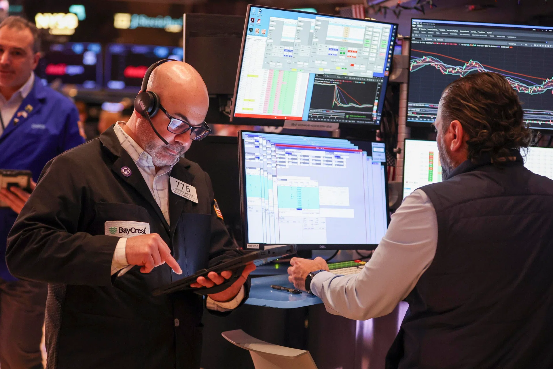 Wall St opens lower on Middle East impasse, mixed earnings