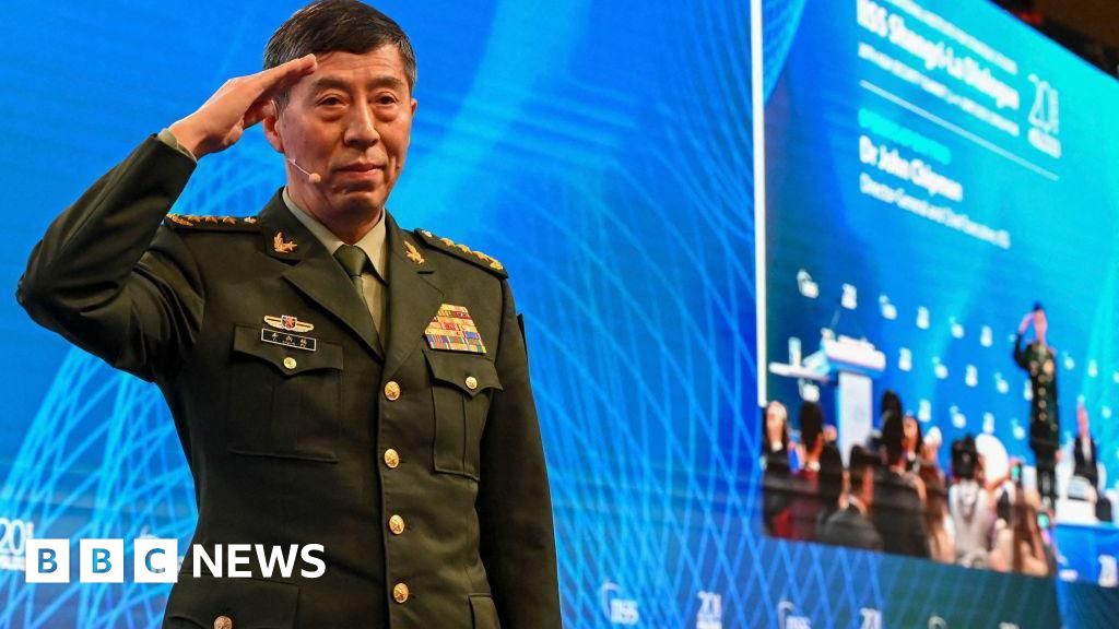 China announces suspended death sentences for former defence ministers