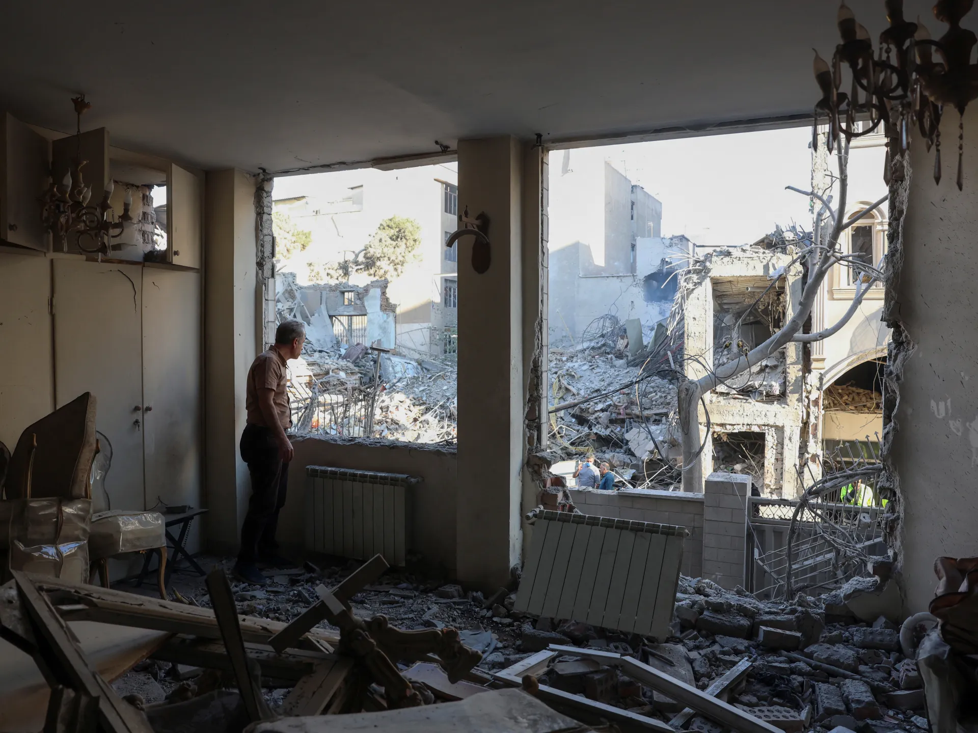 Refugee in my own city: Surviving Tehran’s bombing, with my cat for company