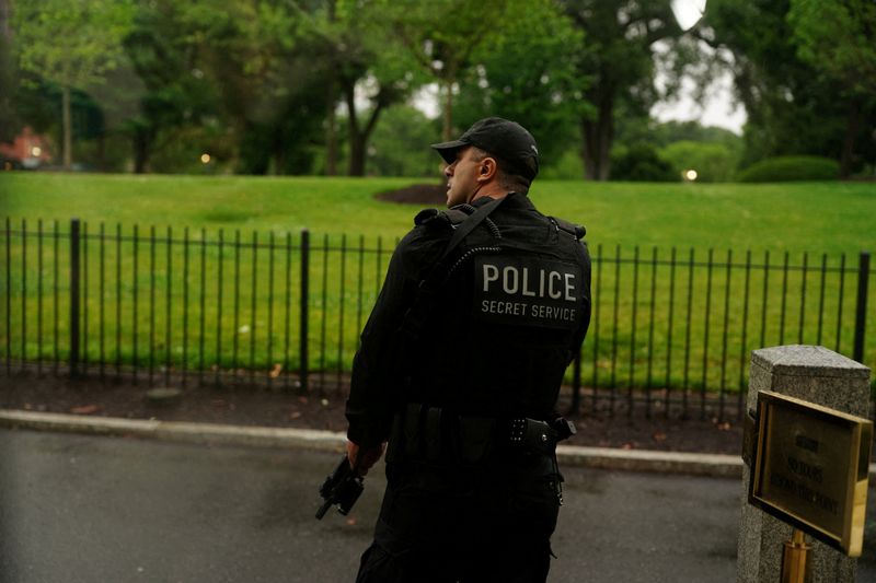 Suspect 'down' after shooting at officers near White House, official says