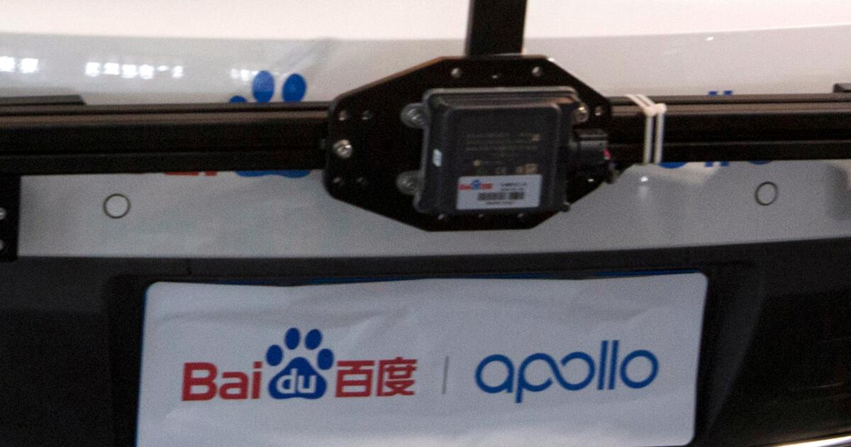 Passengers stranded in moving traffic after robotaxi outage in China’s Wuhan