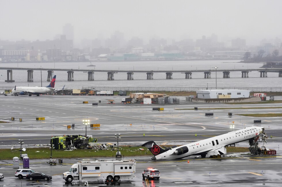 2 pilots killed when jet collides with fire truck at New York's LaGuardia Airport