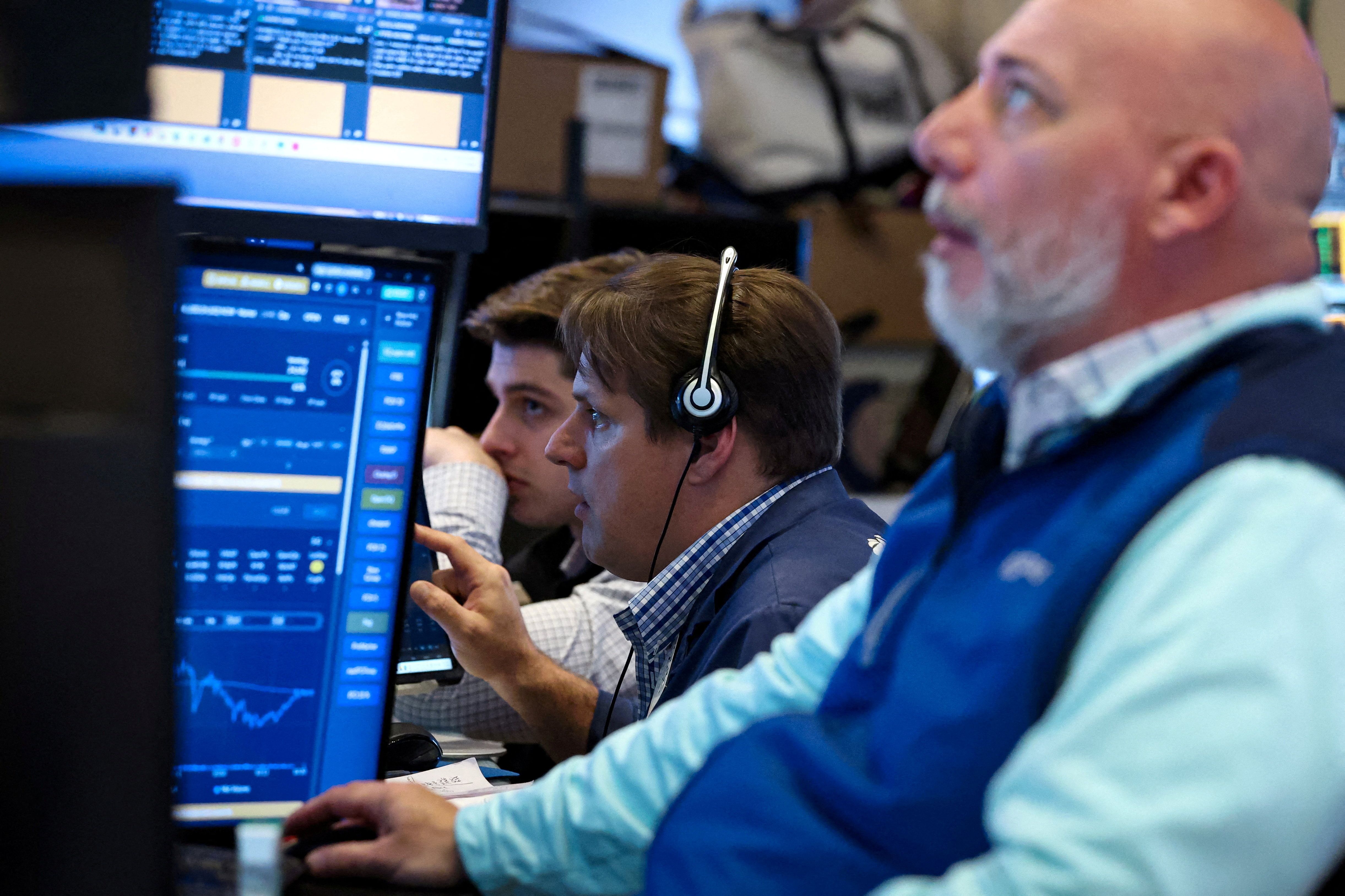 Wall St opens lower on Middle East impasse, mixed earnings