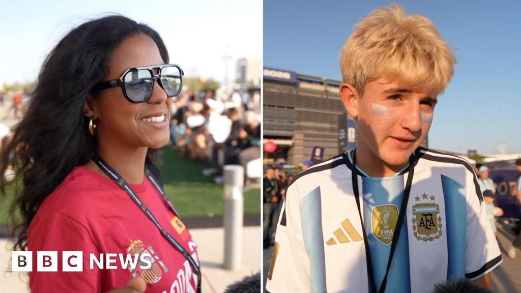 Spanish and Argentinian fans react outside World Cup final