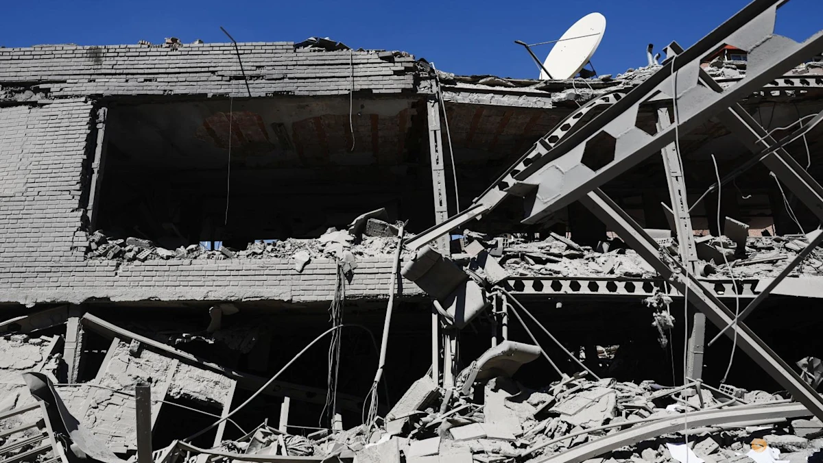 Under airstrikes, Iran defiant on eve of Trump's ceasefire deadline