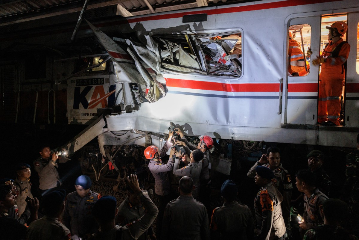 Trains collide near Jakarta, killing seven, injuring dozens