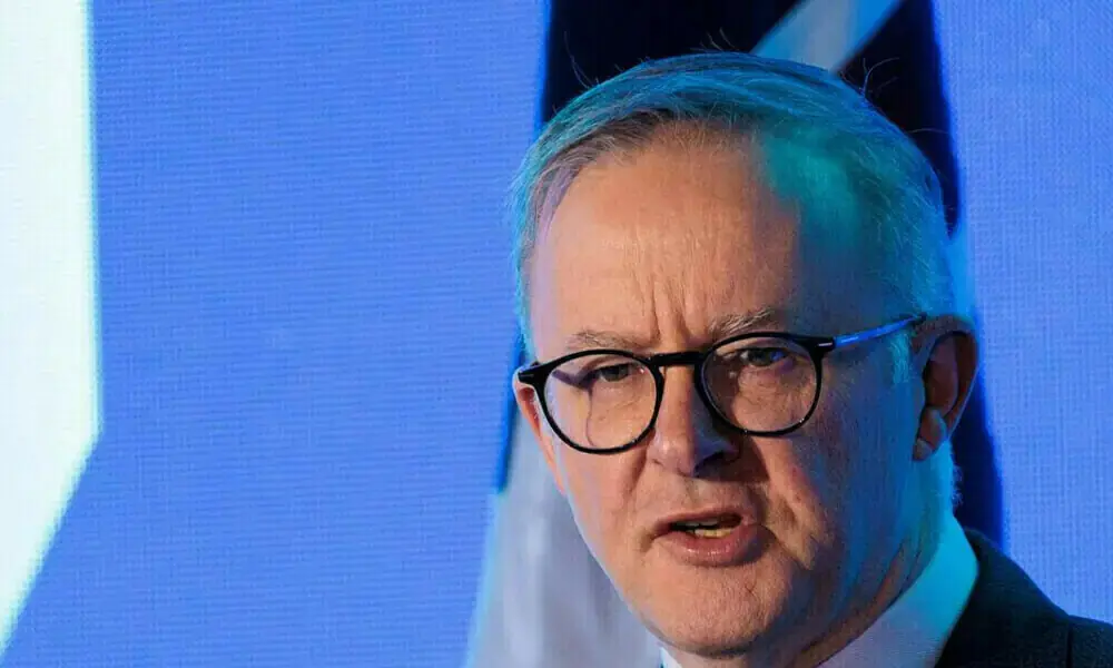 Albanese tells Australia to ‘turn the heat down’ after bomb threat