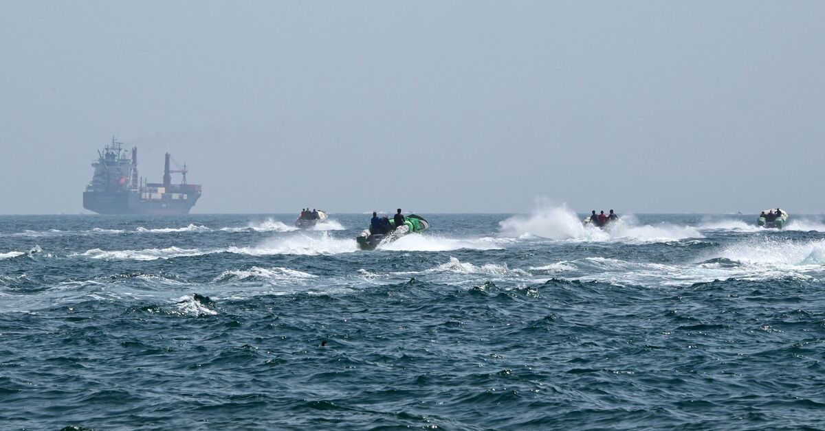 Hormuz traffic slows as Iran threatens to set 'ships on fire'