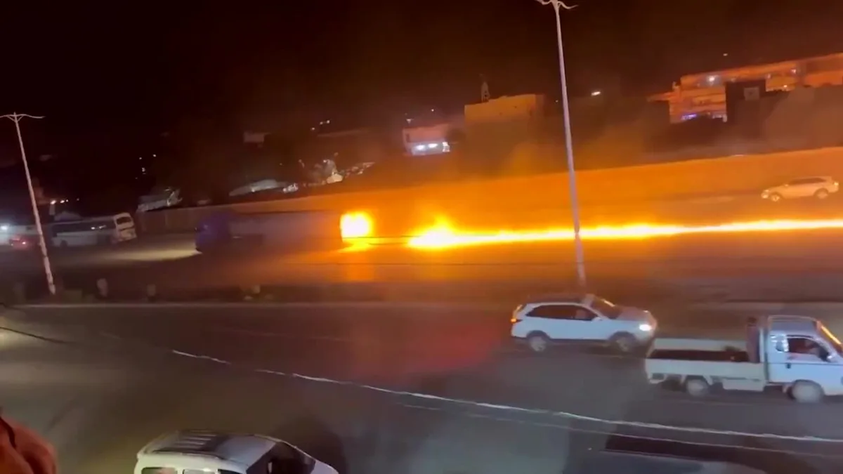 Burning fuel tanker leaves trail of flames on Syrian road