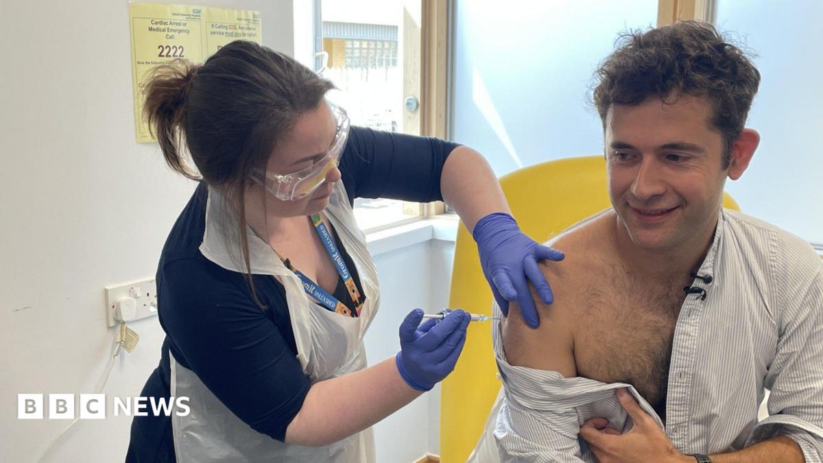 First person gets new experimental vaccine for Ebola