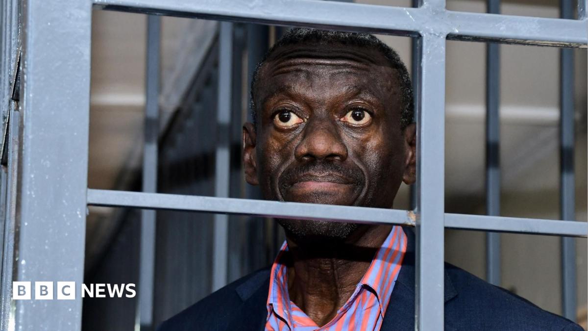 Veteran Ugandan opposition leader collapses in court and in ICU, his wife says