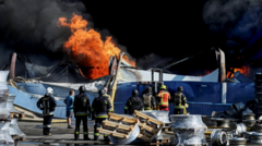 At least 37 dead and hundreds evacuated after strike on Kyiv weapons depot