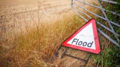 Downpours to continue for UK with risk of flash flooding
