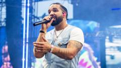 Drake's surprise three-album drop makes UK chart history