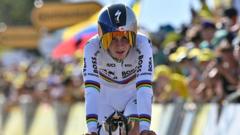 Evenepoel cuts Pogacar's lead with time-trial win