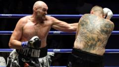 Fury wins low-key warm-up to keep Joshua fight on track