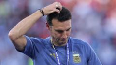 Argentina boss Scaloni leaves news conference in tears talking about his future