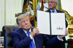 Fact-checking Trump's claims as he rolls back some recommended vaccines