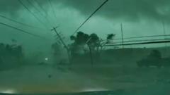 Dashcam captures tornado toppling power lines onto car