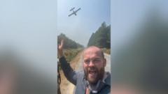 Planes dump water on French wildfires as temperatures rise
