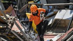 Hundreds of aftershocks jolt Philippines as officials say death toll could rise