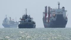 China warns it will protect its interests after US widens sanctions against Iran