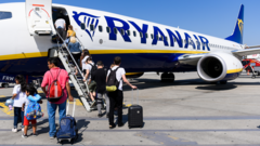 Ryanair says it will reluctantly let parents sit next to children for free