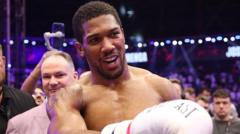 Joshua knocked down twice as dramatic win sets up Fury fight