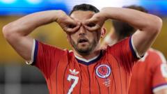 Why does Scotland's McGinn do goggles celebration?