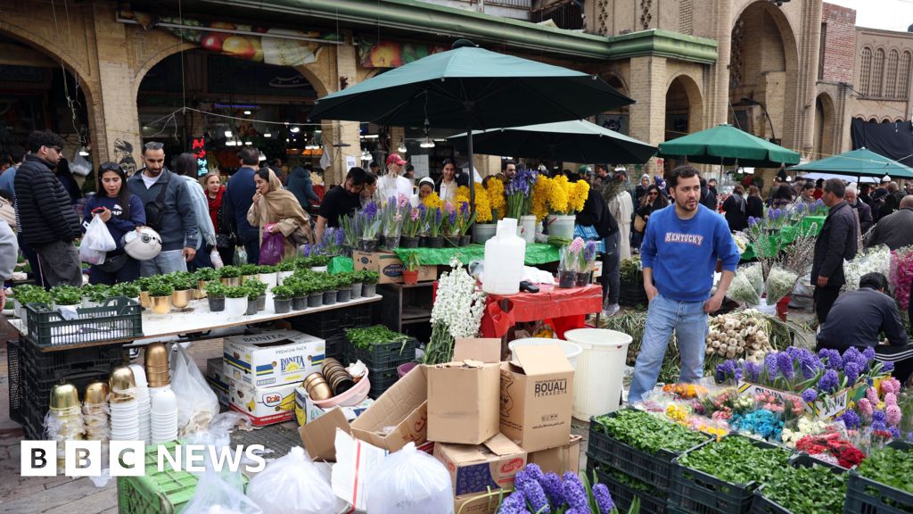 Iranians prepare for Persian new year under shadow of war