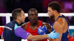 Boxer Abdul - grandson of dictator - disqualified for headbutt