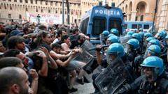 Dozens hurt in Bologna protests after man dies while being restrained by police