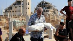 Israeli strikes in Gaza kill 12, including family of six, medics say