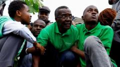 Kenya's ex-chief justice arrested at protest against building on national park