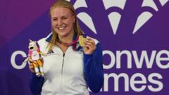 The gold medal-winning Para-swimmer competing in non-disabled race