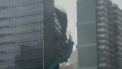 Watch: Scaffolding tumbles from Hong Kong building as Typhoon Noul makes landfall