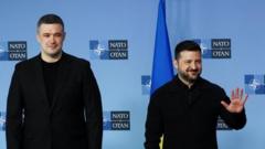 Ukraine's ousted defence minister insists on being reinstated
