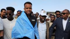 World Cup referee denied US entry arrives home to hero's welcome in Somalia