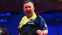 Littler throws nine-darter in superb Matchplay win