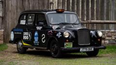 Meet the duo visiting all 16 World Cup venues in a London cab
