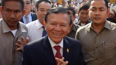Cambodia's former opposition leader receives royal pardon for 27-year sentence