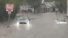 Flash flooding interrupts half-marathon, submerges cars
