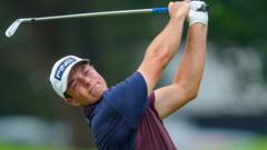 Hovland in tie for lead at Tour Championship