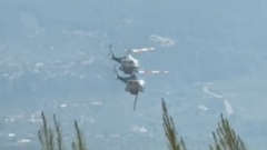 Two crew killed as British pilot survives after firefighting helicopters collide in Greece