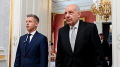 Hungary's president agrees to stand down after parliament backs removal