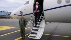 RAF jet carrying defence secretary has signal jammed near Russian border