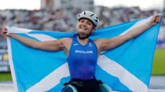 Woods sets Games record to claim gold for Scotland